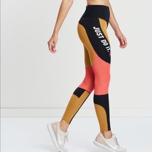 Nike Training High Waist Color Block Leggings In Black And Gold